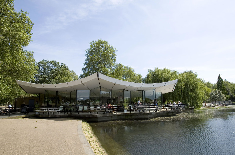 The cafe has indoor and outdoor seating and overlooks the water.