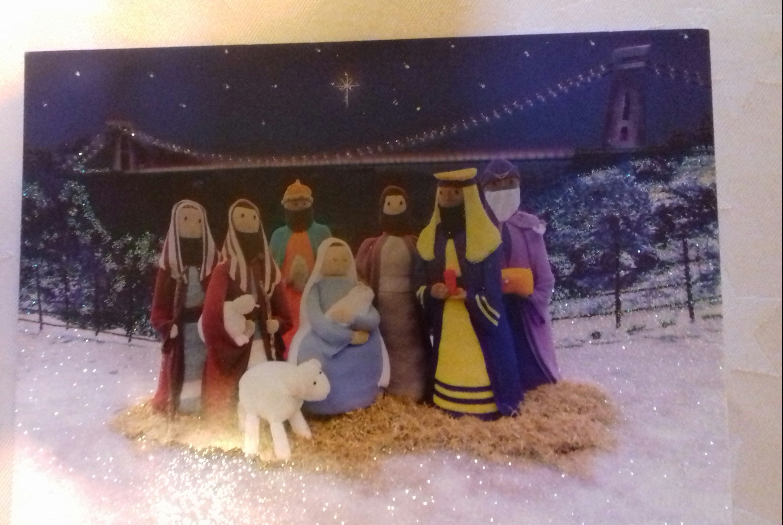 Knitted figures at night by the Clifton Suspension bridge