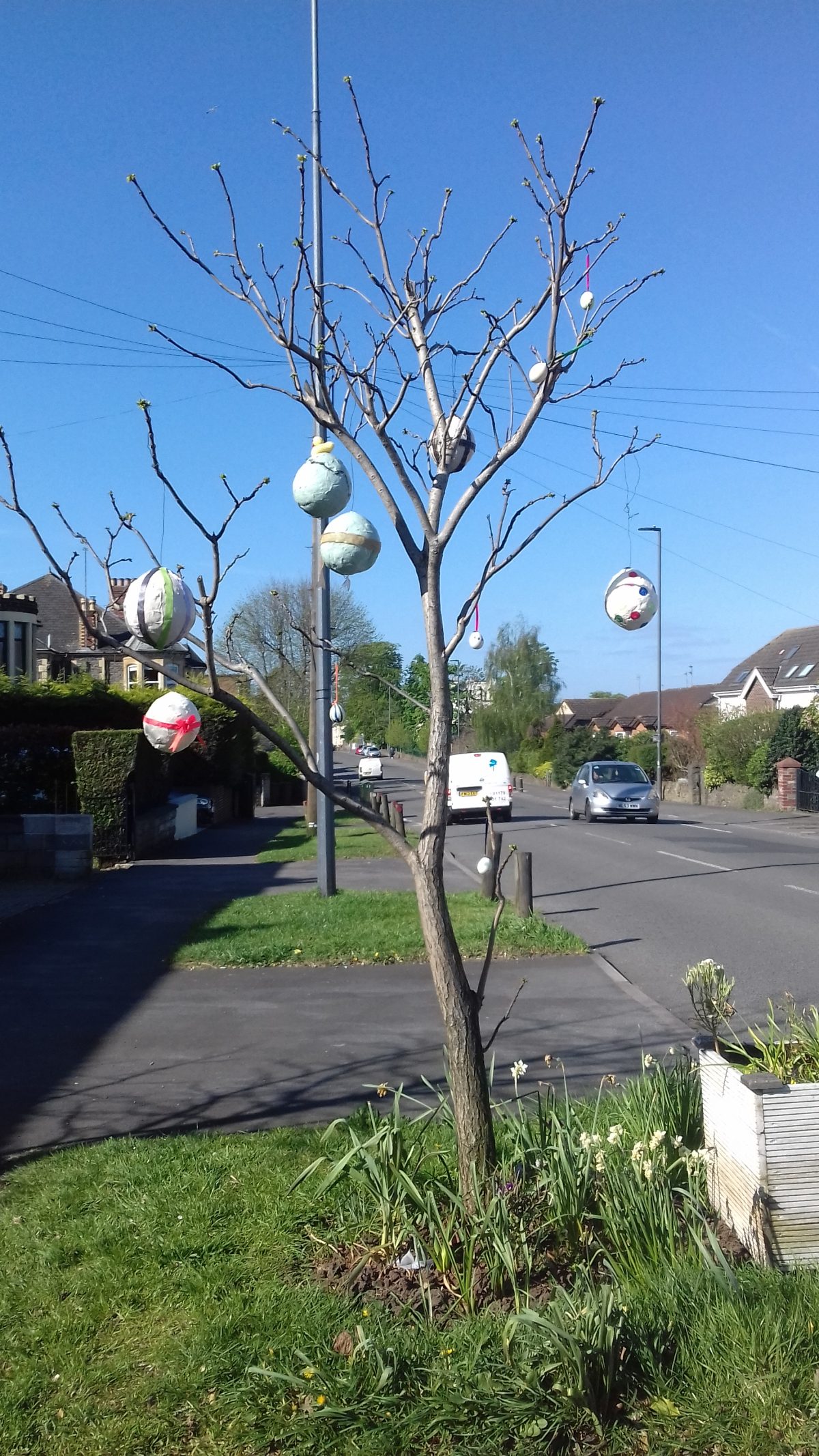 Paper mache eggs in a tree.