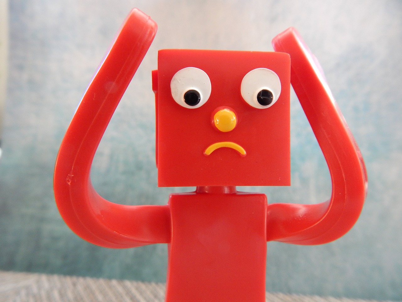 Cartoon figure with hands on his head